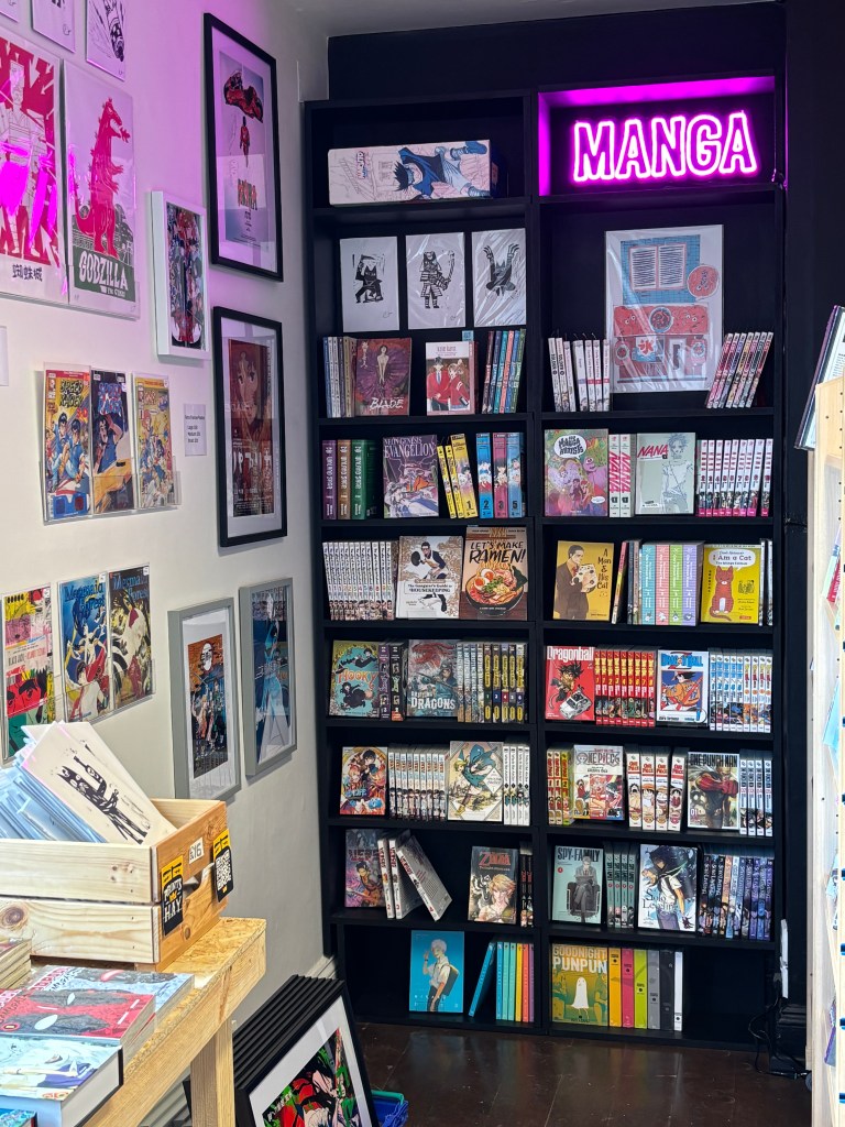 The stores wide range of Manga titles on display